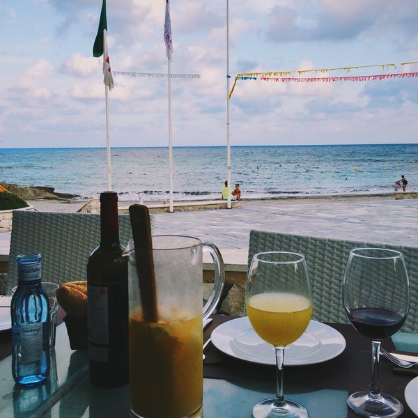 Photo taken at Mandala Beach Bar &amp; Restaurant by Polina V. on 9/13/2016