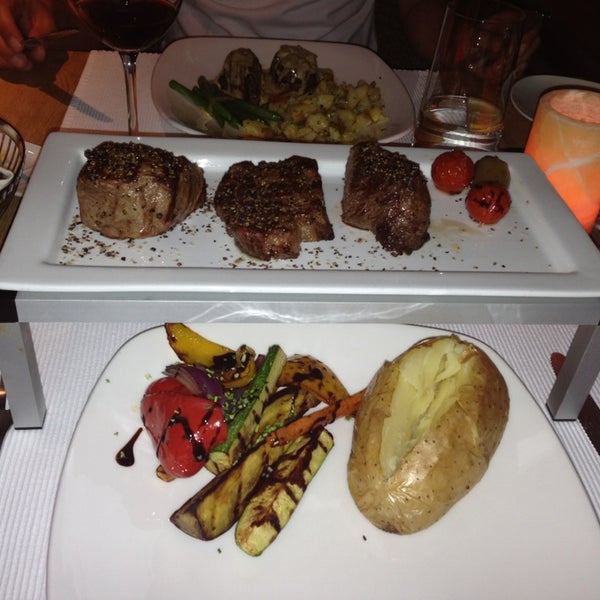 Photo taken at Columbia Steak House by Olga K. on 6/6/2013