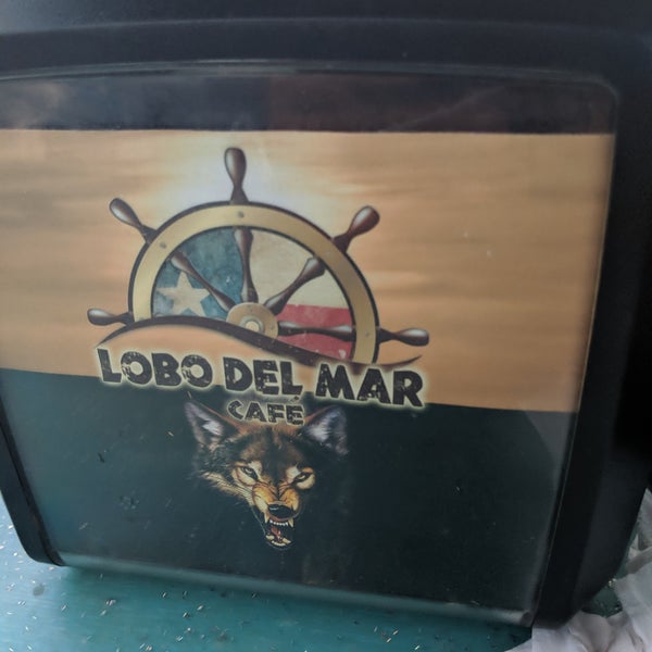 Photo taken at Lobo Del Mar Cafe by Justin S. on 6/5/2019