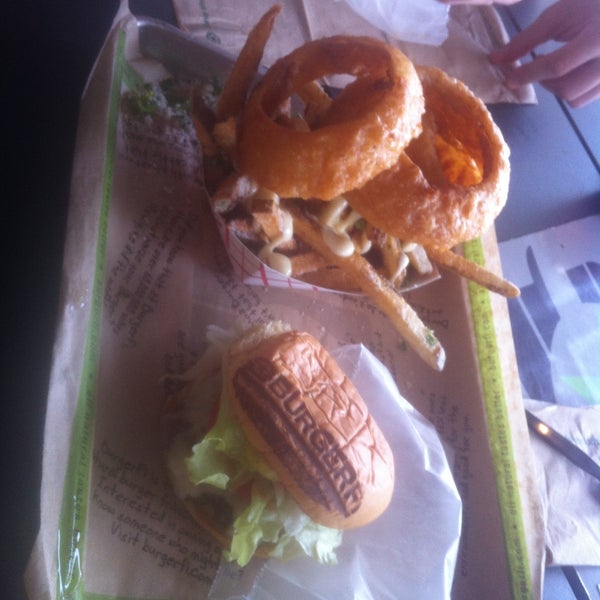 Photo taken at BurgerFi by Lauren V. on 5/1/2013