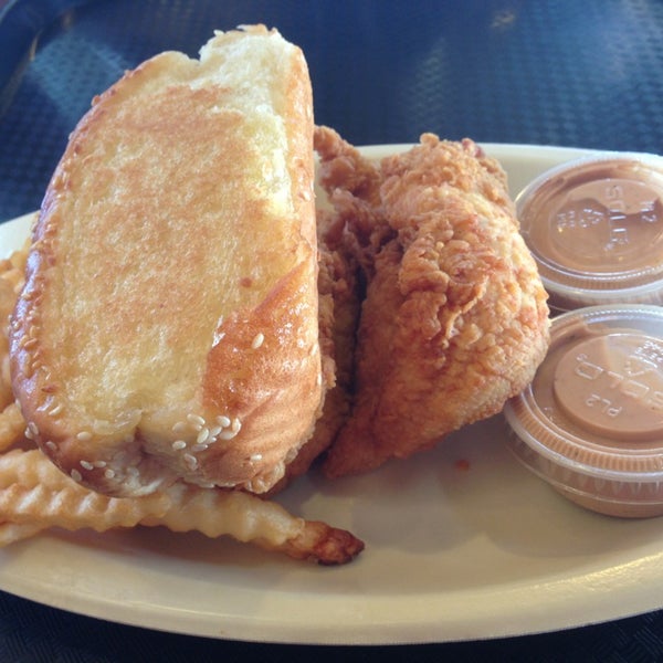 Photo taken at Raising Cane&#39;s Chicken Fingers by Nathan P. on 12/21/2012