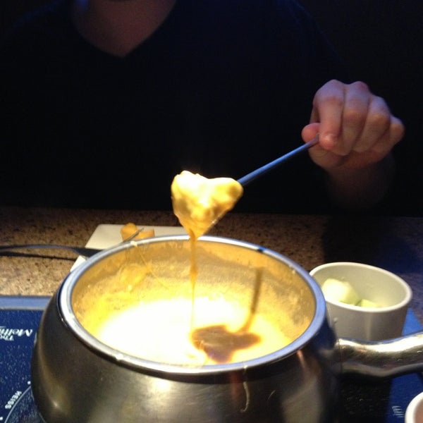 Photo taken at The Melting Pot by Maria H. on 3/3/2013