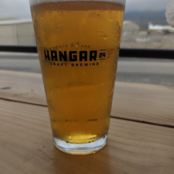 Photo taken at Hangar 24 Craft Brewery by Angel G. on 5/11/2019