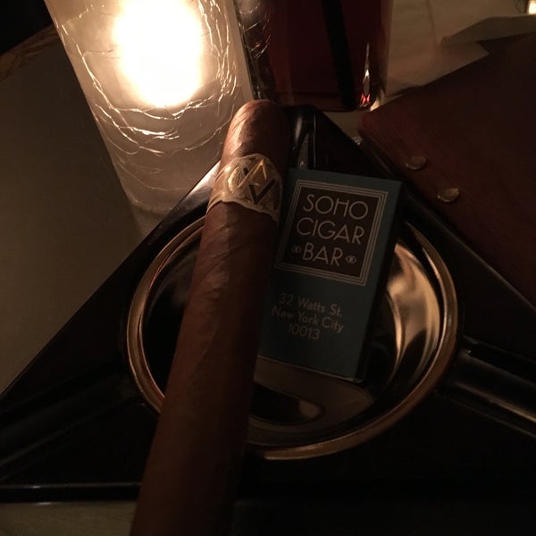 Photo taken at SoHo Cigar Bar by Nick A. on 11/30/2015