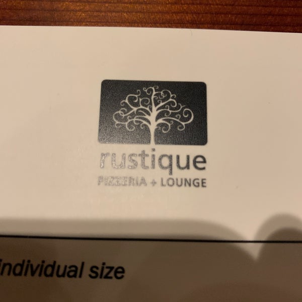 Photo taken at Rustique Pizzeria &amp; Lounge by The Grinch on 10/31/2020