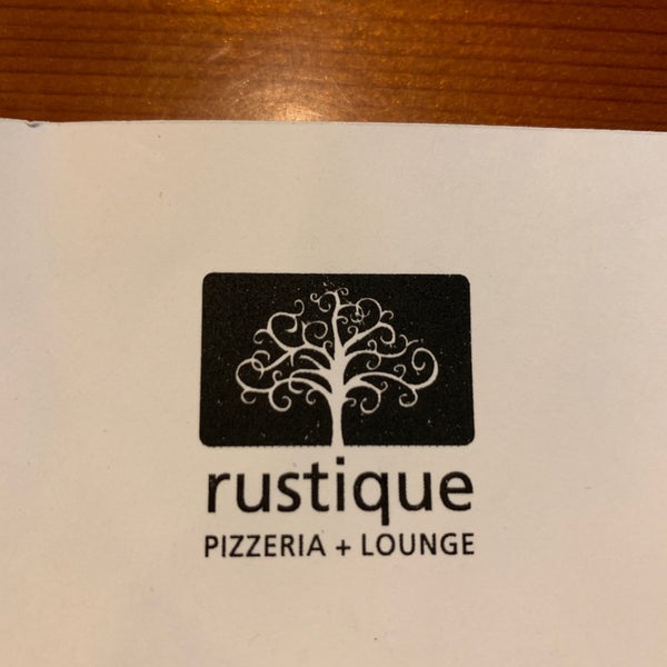 Photo taken at Rustique Pizzeria &amp; Lounge by The Grinch on 3/10/2019