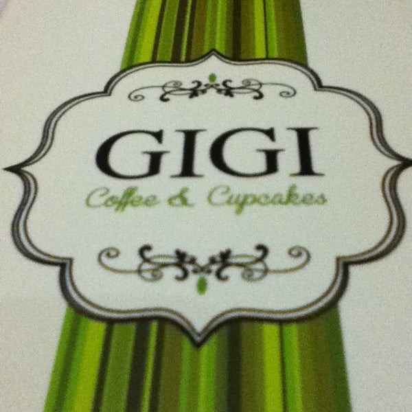Photo taken at GIGI Coffee &amp; Cupcakes by Corinne S. on 7/16/2013
