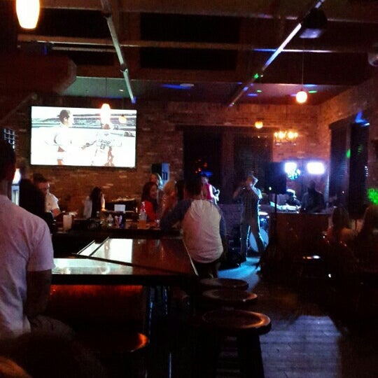 Photo taken at Moore&#39;s Tavern &amp; Sports Bar by Büşra S. on 6/21/2015