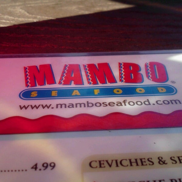 Photo taken at Mambo Seafood by Farina A. on 2/27/2013