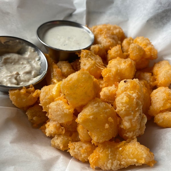 Voted best fried cheese curds in the state, and it lives up to the hype!! The batter is light and the cheese pull is insane! Get Tiger blue and ranch for dipping!!