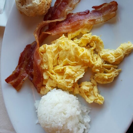 Early bird special 8am-9am $5.99 2 eggs scrambled 2 bacon scoop rice 2 biscuits and all you can drink coffee.strawberry waffles also good $8.99