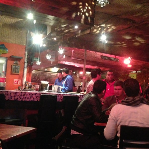 Photo taken at El Muelle Seafood Bar by Jose M. on 1/19/2013