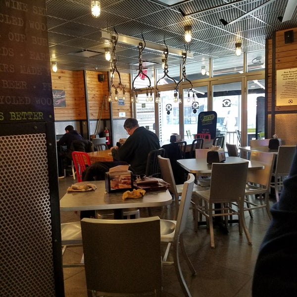 Photo taken at BurgerFi by Jessica K. on 1/2/2018