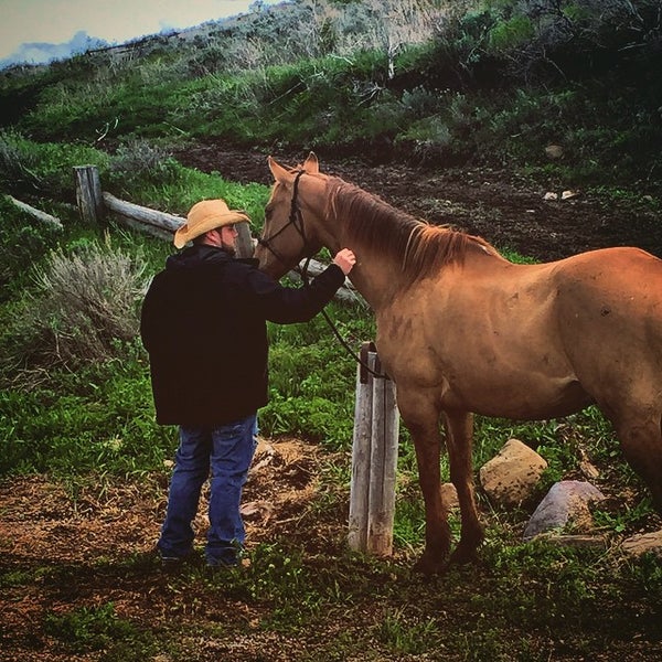 Photo taken at Spring Creek Ranch by Robbie D. on 5/25/2015