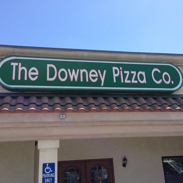 Photo taken at Downey Pizza Company by juan u. on 4/1/2014