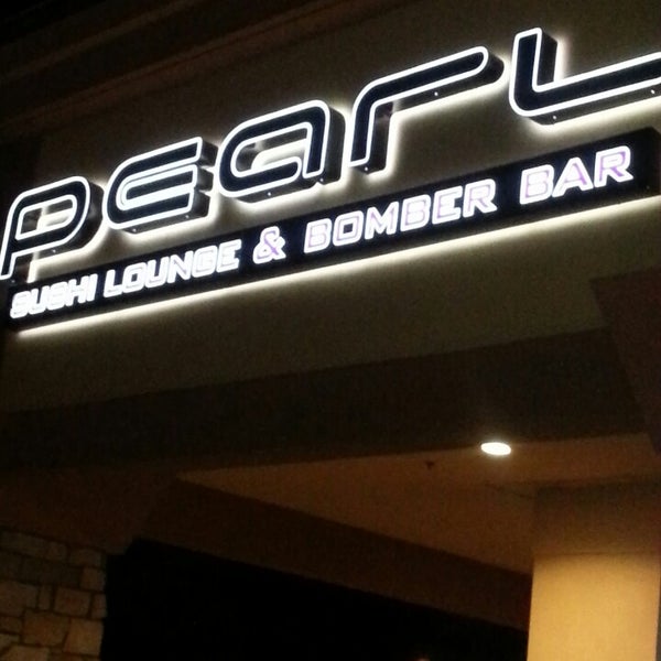 Photo taken at Pearl Sushi Lounge &amp; Bomber Bar by Julie S. on 6/24/2014