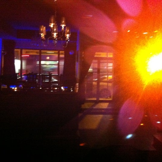 Foto scattata a Downtown Bar &amp; Lounge da Russ A. il 12/19/2012