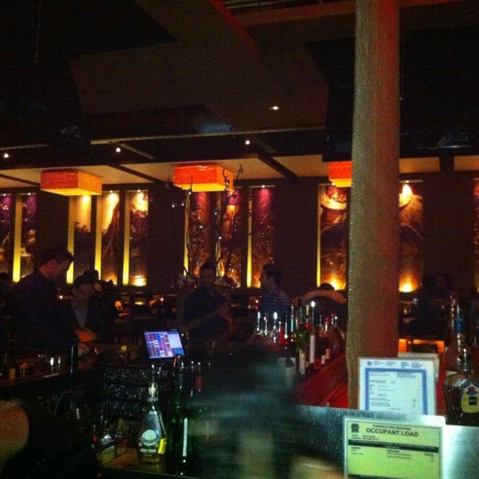 Photo taken at Spice Route Asian Bistro + Bar by Les Carnets D. on 12/30/2012