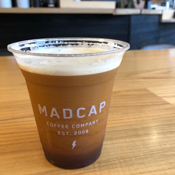 Photo taken at Madcap Coffee by David V. on 4/27/2018