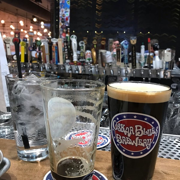 Photo taken at Oskar Blues Grill and Brew by Robert P. on 3/21/2019