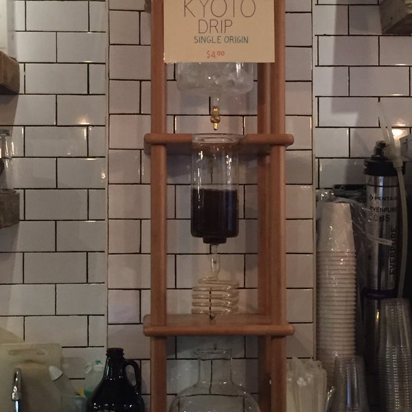 Photo taken at Nolita Mart &amp; Espresso Bar by Bon on 10/4/2015