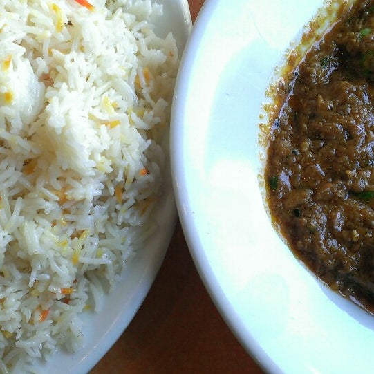 Photo taken at Pakwan Indian Restaurant by Angie C. on 7/3/2014