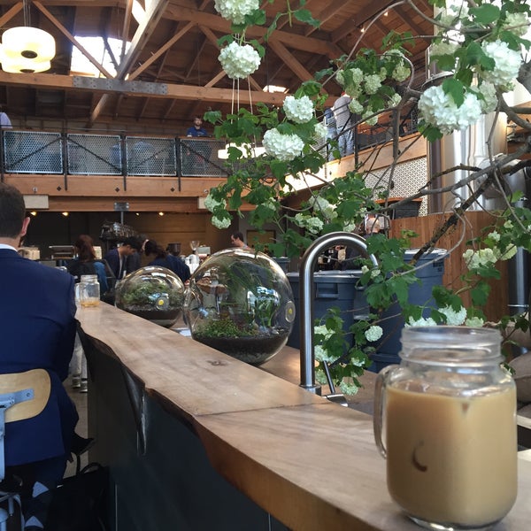 Photo taken at Sightglass Coffee by Angie C. on 4/14/2015