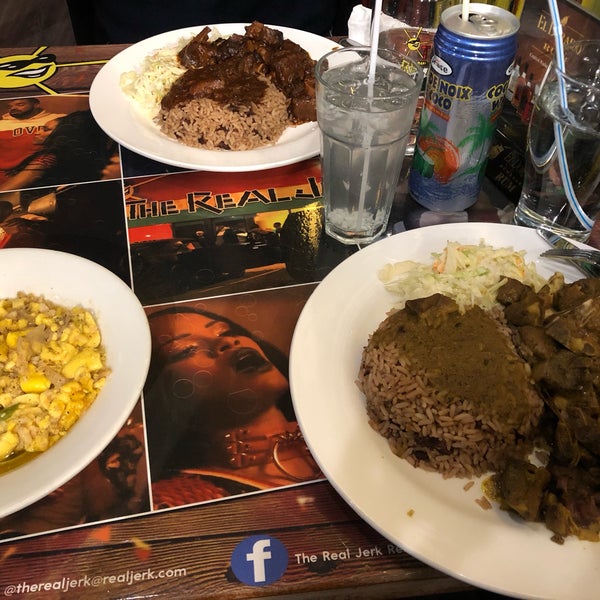 Photo taken at The Real Jerk Restaurant by Angie C. on 11/23/2018