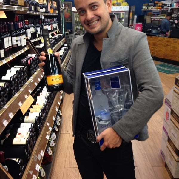 Photo taken at Grand Wine &amp; Liquors by Laura S. on 11/7/2013