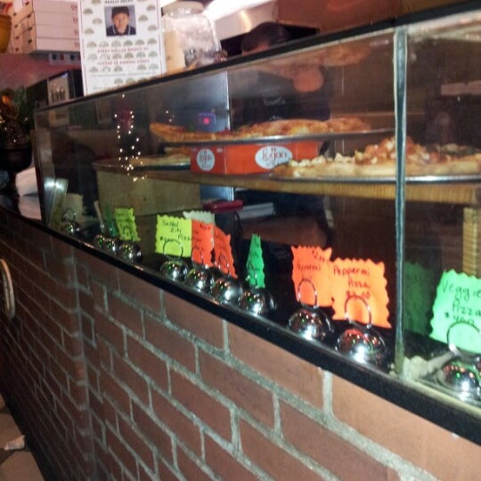 Photo taken at Danny&#39;s Pizzeria II by Angela M. on 12/18/2012