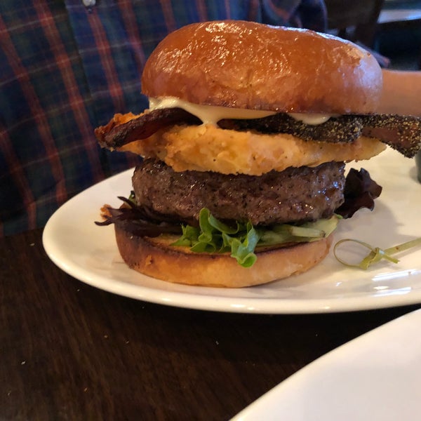 Photo taken at Left Bank Burger Bar by Claudia C. on 5/27/2018