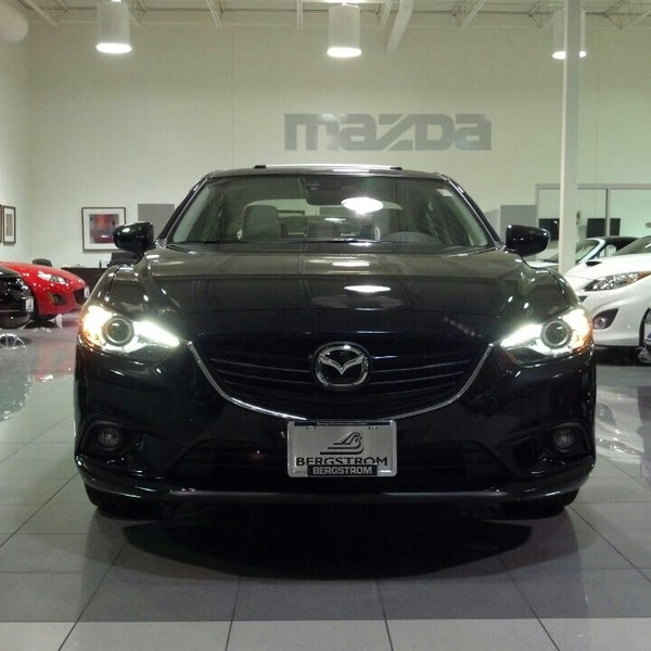 Photo taken at Bergstrom Victory Lane Imports (Hyundai, Mazda, Mitsubishi &amp; Nissan) by Lou V. on 3/1/2013