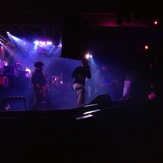 Photo taken at Revolution Bar &amp; Music Hall by Rebecca S. on 12/17/2012