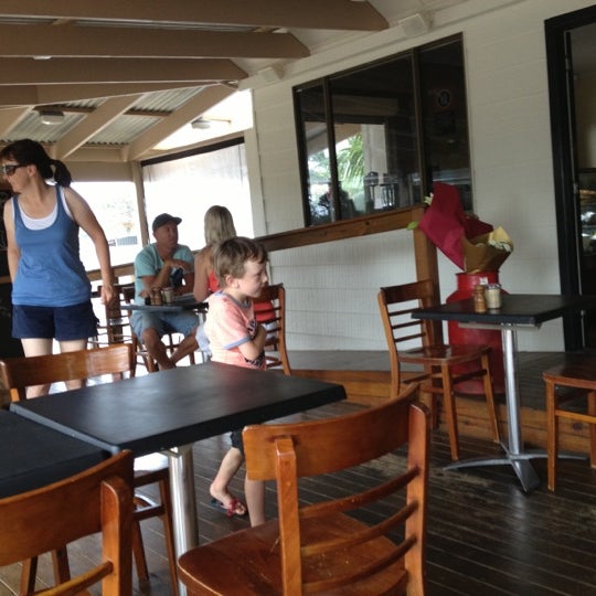Photo taken at Blackboard at the Beach Cafe Restaurant by Stef K. on 12/21/2012