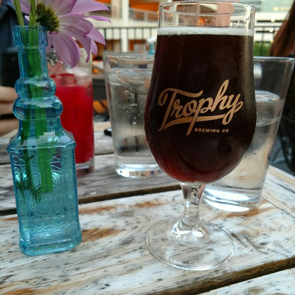 Photo taken at Trophy Tap &amp; Table by Devon T. on 5/10/2018