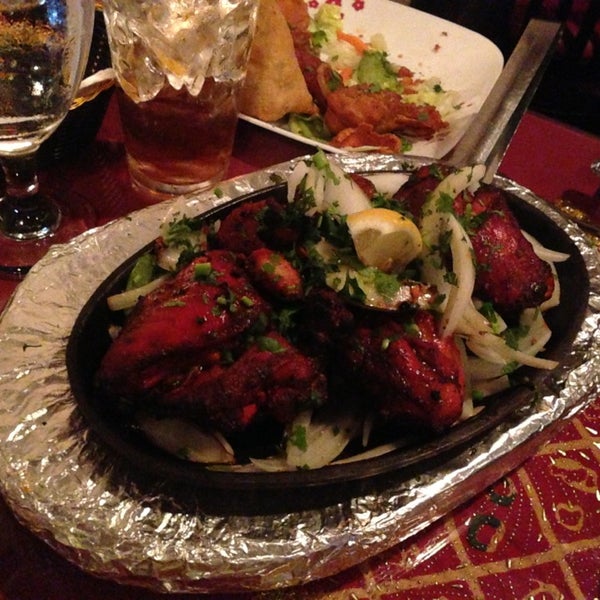 Photo taken at Moghul Fine Indian Cuisine by Andy C. on 5/27/2013
