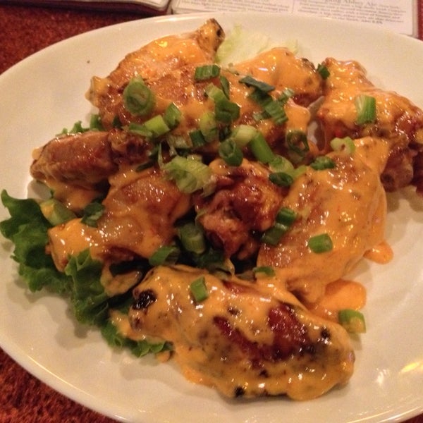 The "Thai" wings were undercooked and drenched in velveeta cheese. Yuck