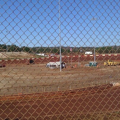 Photo taken at Dixie Speedway Home of the Champions by Brian L. on 1/4/2013