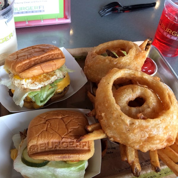 Photo taken at BurgerFi by Jessica H. on 3/14/2014