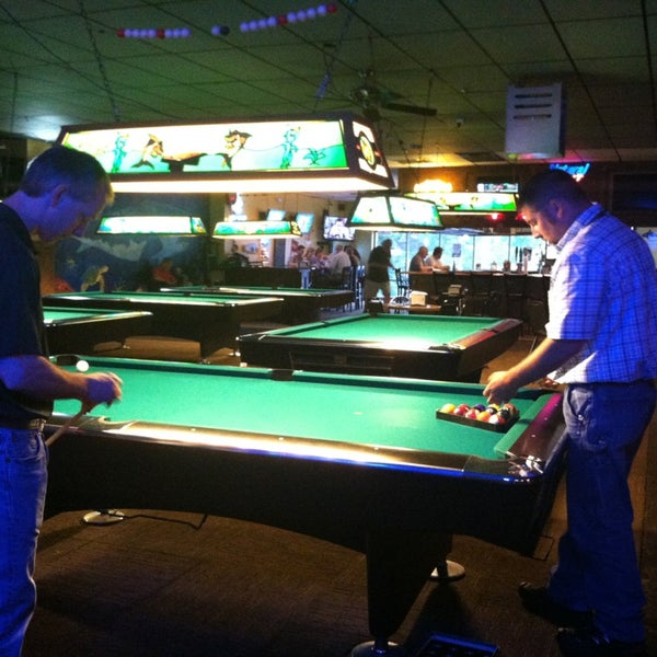 Photo taken at Sharkys Place Sports Bar and Billiards by Meshell H. on 5/31/2013