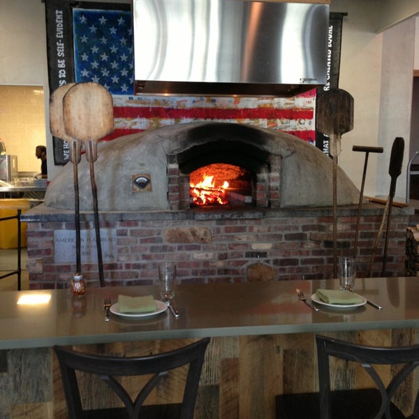 Photo taken at American Flatbread Tribeca Hearth by Athena P. on 8/14/2013