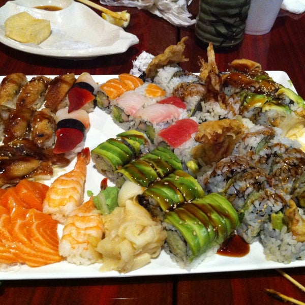 Photo taken at Sushi Kingdom by Chi L. on 9/12/2013