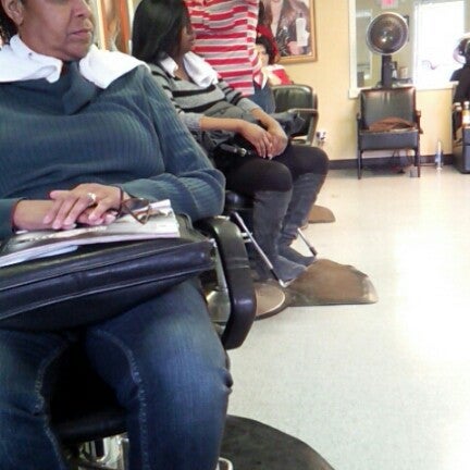 Photo taken at Sula&#39;s Dominican Hair Salon by Courtney B. on 2/2/2013
