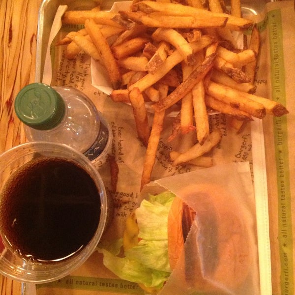 Photo taken at BurgerFi by Марина В. on 3/13/2013