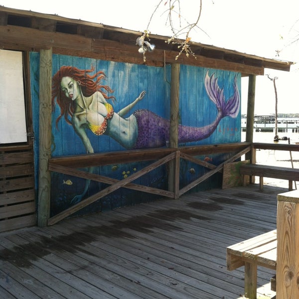 Photo taken at Pirate&#39;s Cove Marina &amp; Restaurant by John R. on 4/2/2013