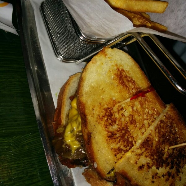 Photo taken at Burgers and More by Emeril by Zoe A. on 4/7/2015