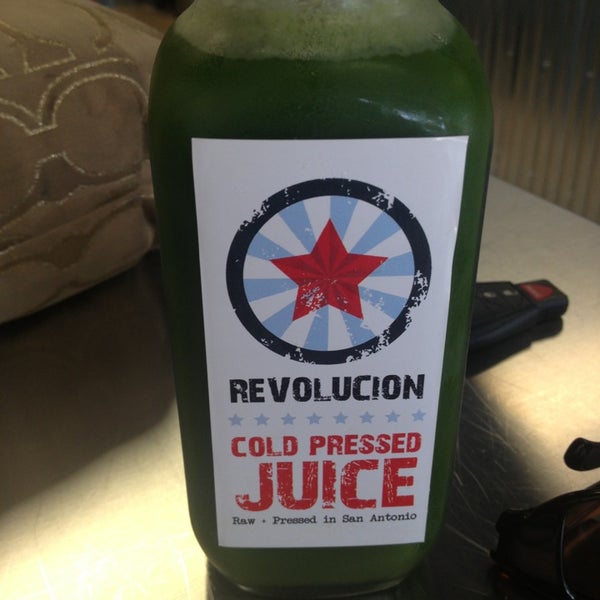 Photo taken at Revolucion Coffee + Juice by Kendra K. on 4/13/2013