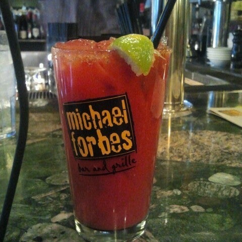 Photo taken at Michael Forbes Bar &amp; Grille by Sarah C. on 12/31/2012