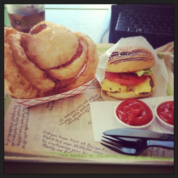 Photo taken at BurgerFi by Amanda C. on 6/25/2013