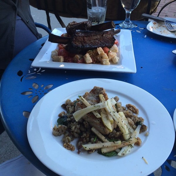 Photo taken at CRāVing Restaurant by Jim R. on 6/22/2014